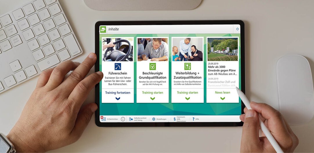 Tablet auf Schreibtisch von oben mit dem Startbildschirm der Vogel BKF App