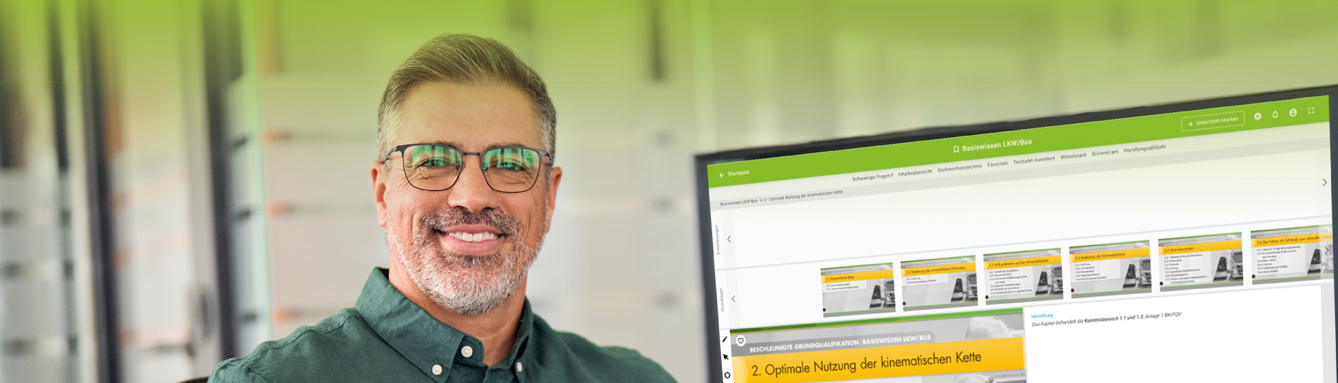 Ausbilder sitzt vorm PC mit PC Professional 